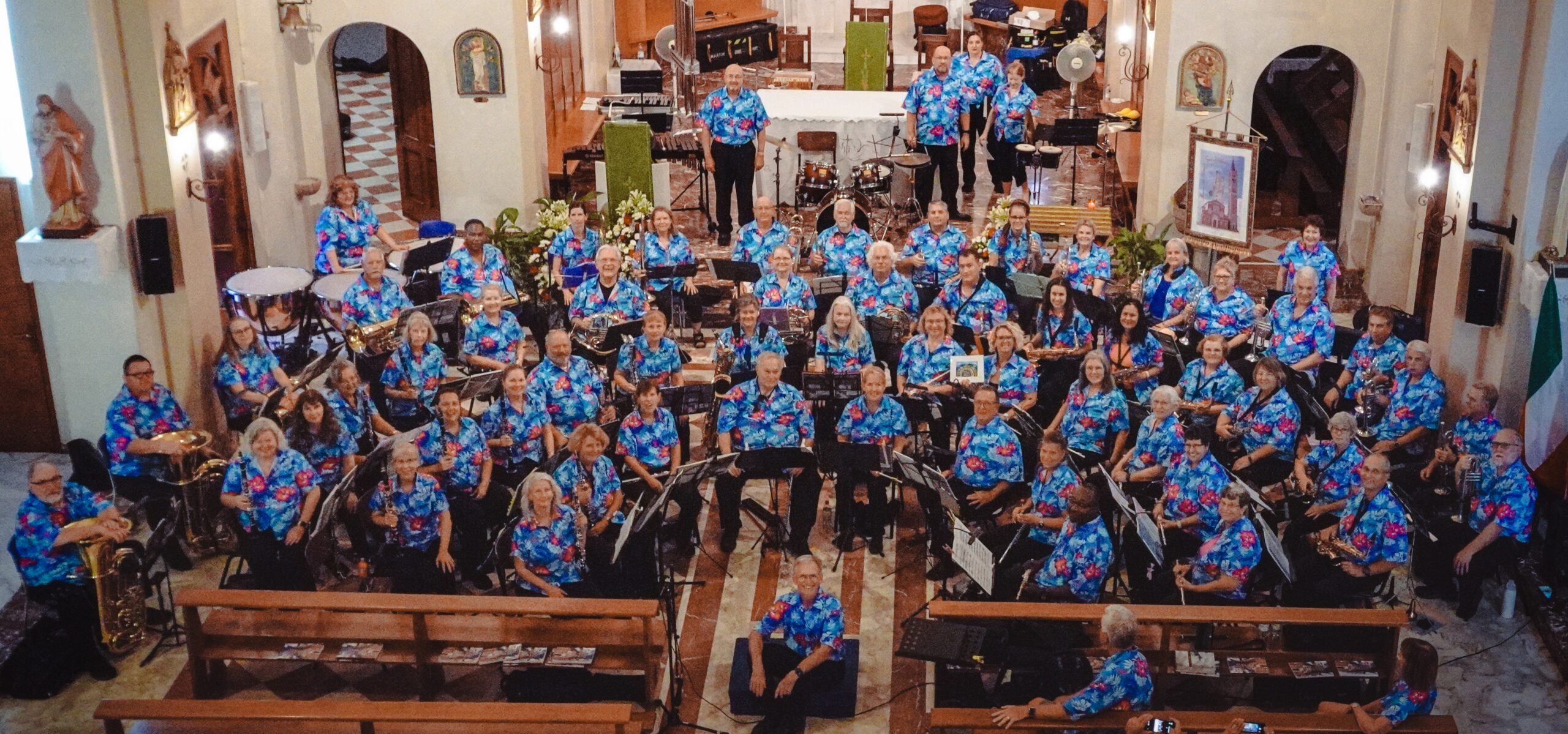 Symphonic Band of Florida ensemble performing in a church setting