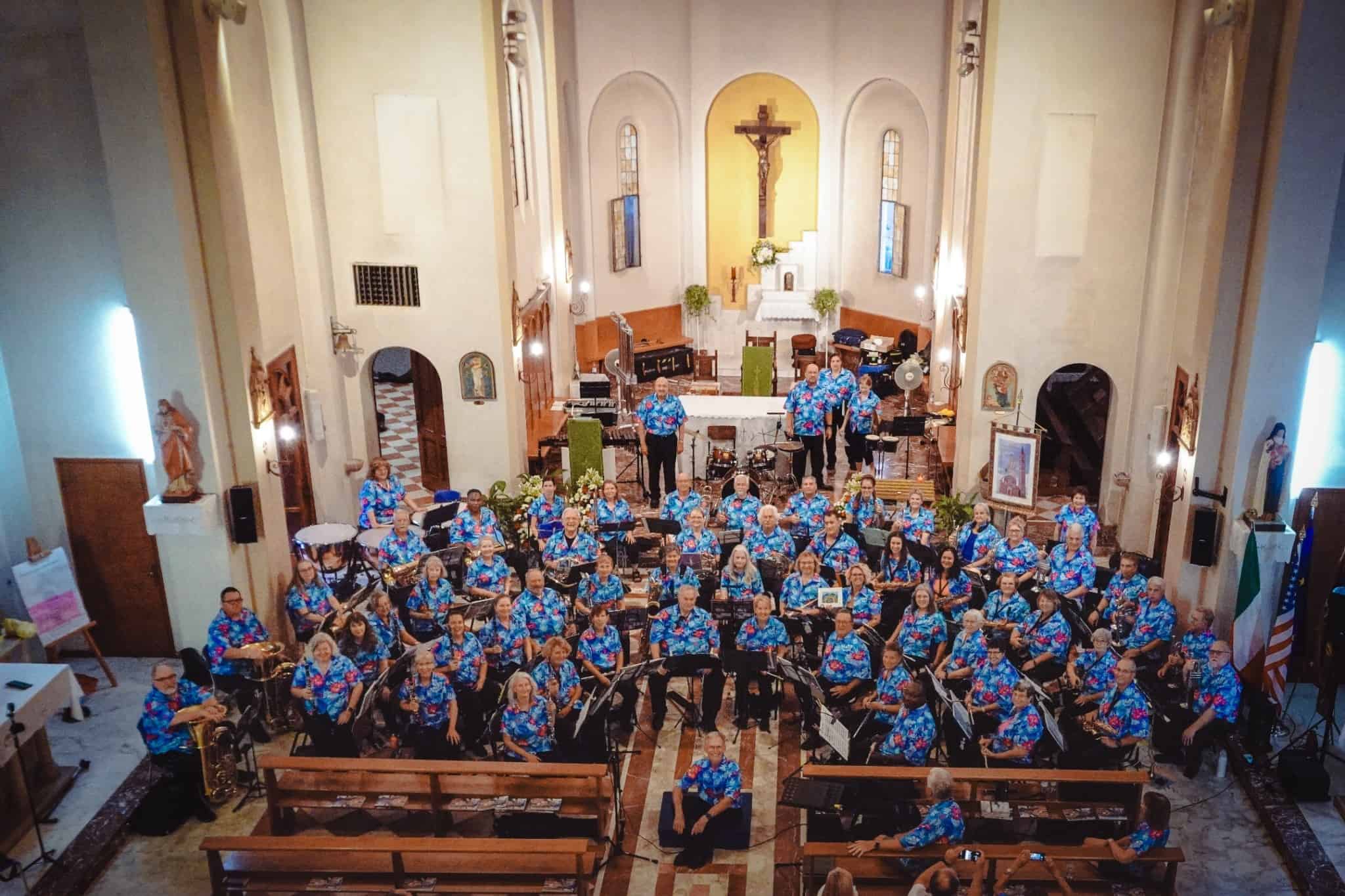 Symphonic Band of Florida ensemble performing in a church setting